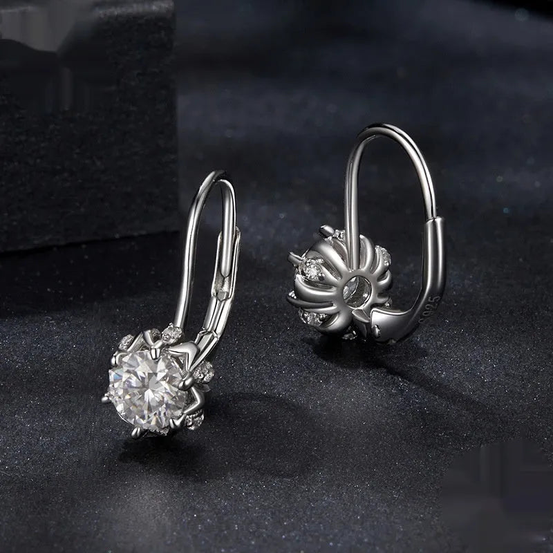 Sterling silver flower bud clip-on earrings with 0.5 carat moissanite centrepiece and white gold plating
