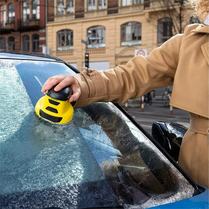 Yellow cordless electric snow scraper for car window deicing with USB charging cable