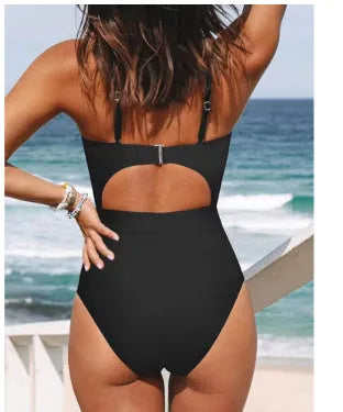 Black women's strapless one-piece swimsuit with cross-back detail on a mannequin.