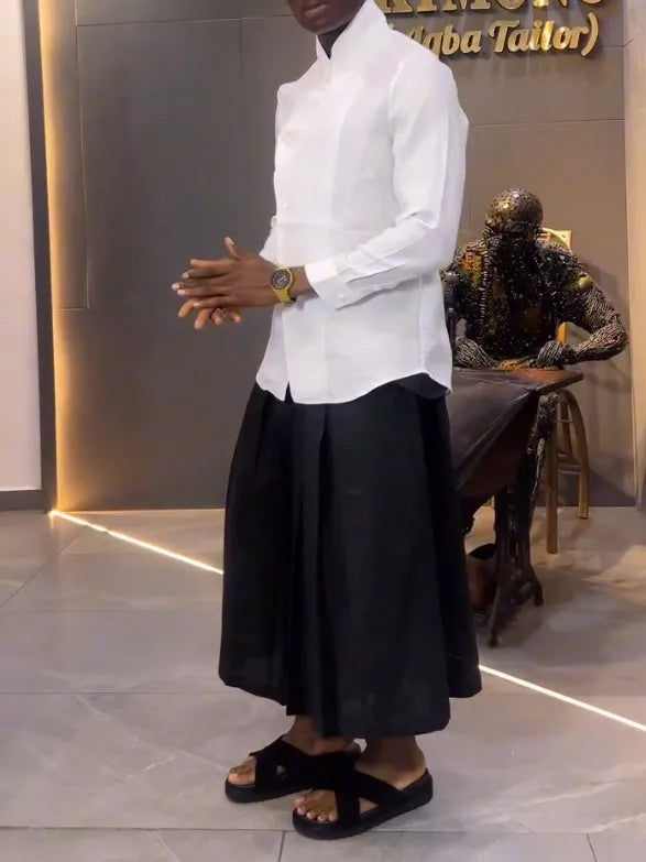 White asymmetric front shirt with black pleated trousers casual co-ord set