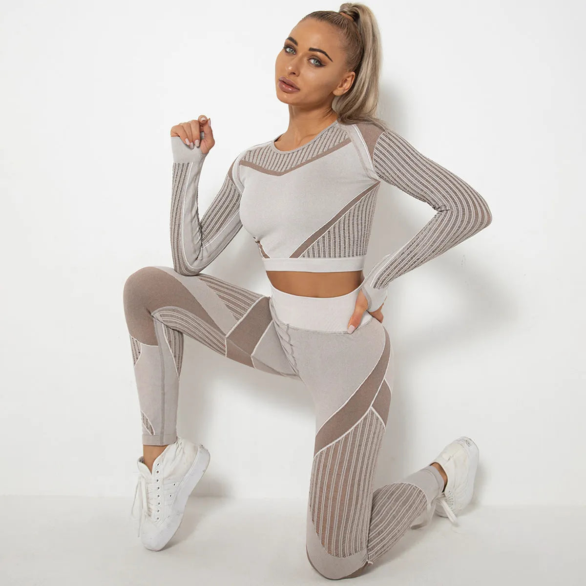 Ethkafi women's seamless long-sleeved yoga wearsuit in a striped pattern.
