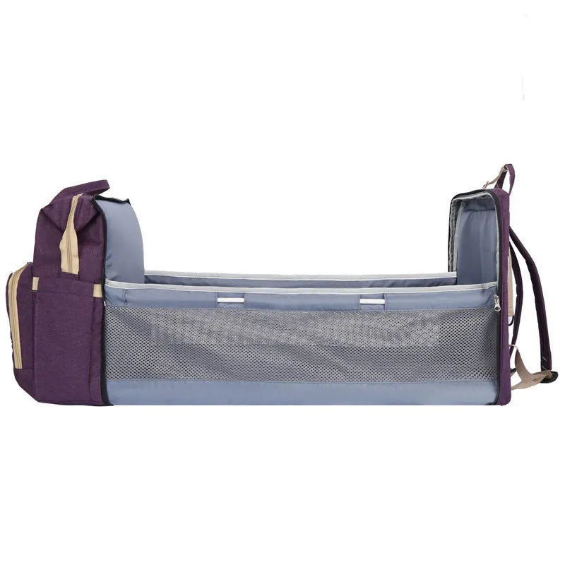 Lightweight folding mummy bag in nylon with USB interface and curved shoulder strap