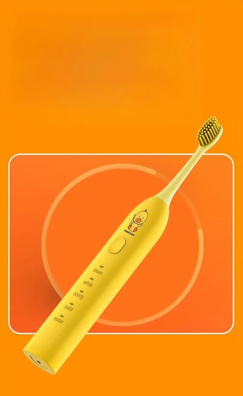 Small yellow duck design USB rechargeable electric toothbrush with soft bristles.
