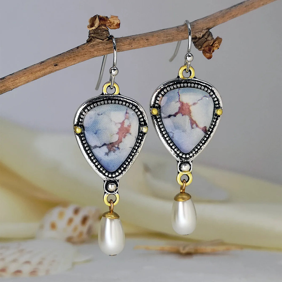 Women's retro blue drop earrings with geometric design featuring synthetic opal and pearl on electroplated metal