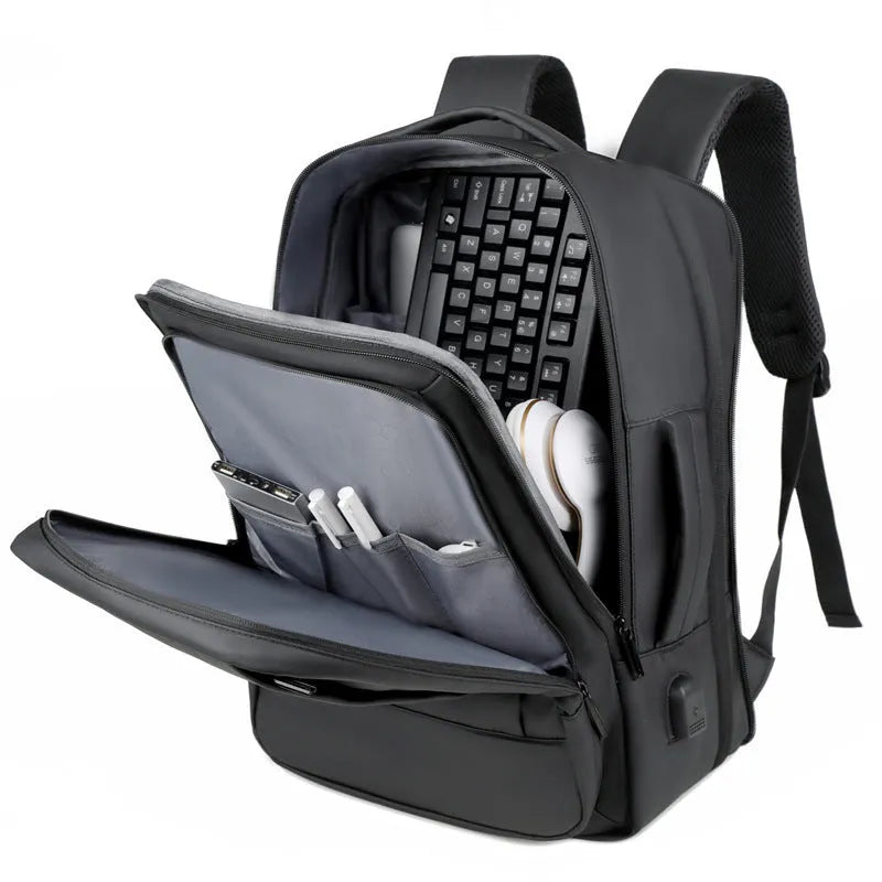 Black waterproof Oxford cloth business backpack with curved shoulder straps and derm leather accents