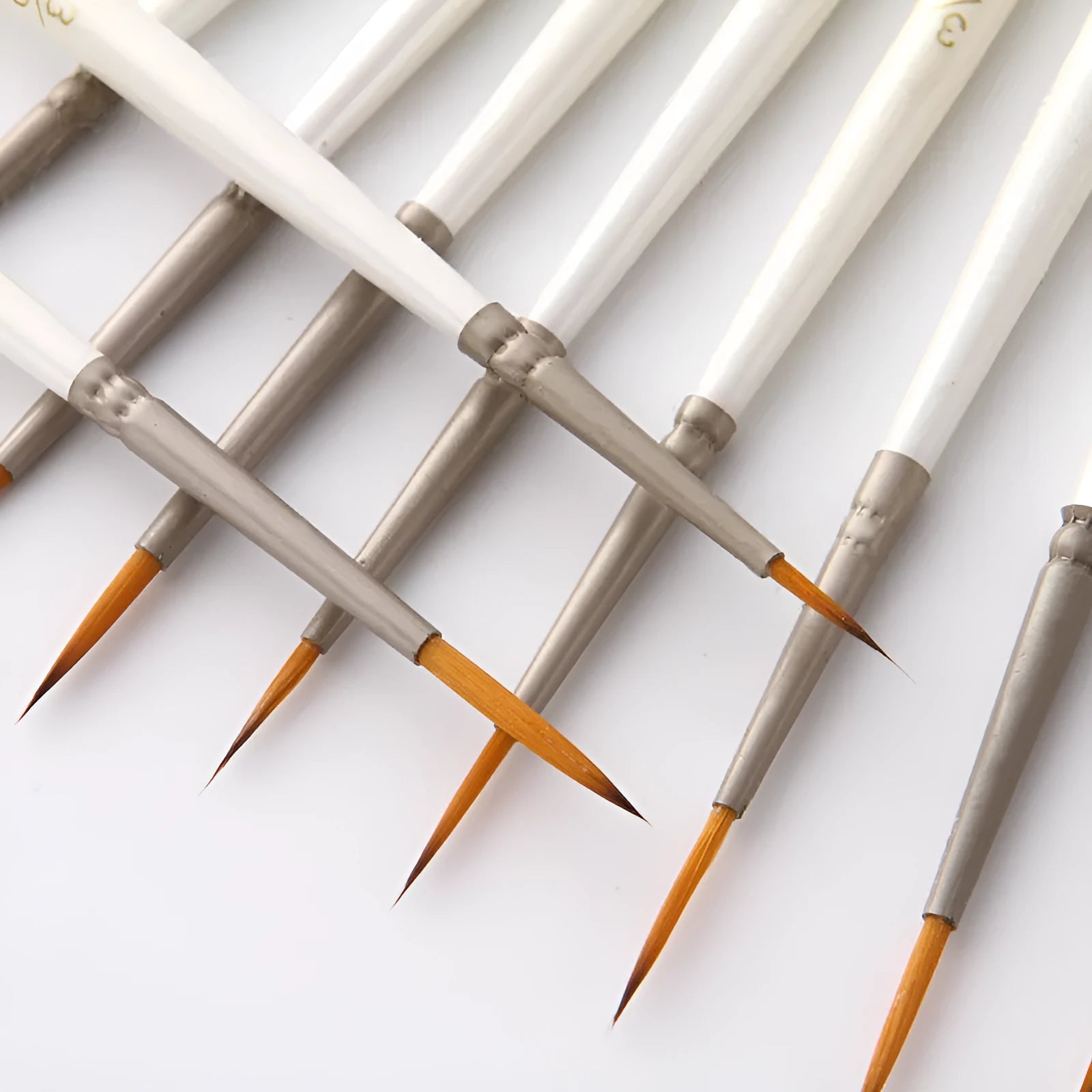 Pearl white fluorescent art marker set with 12 nylon wool brushes in a solid wood holder.