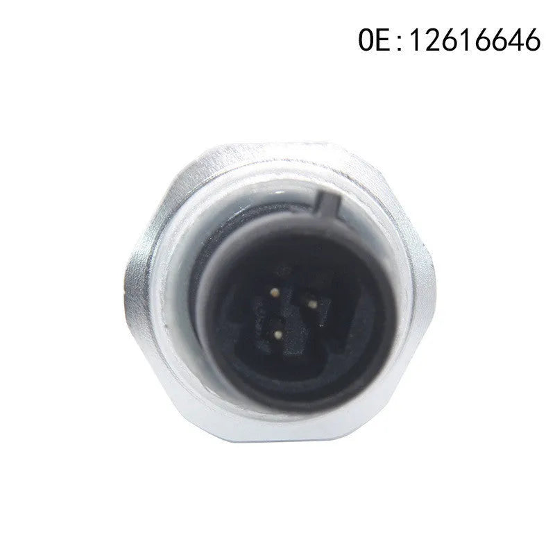 Silver metal automotive fuel pressure sensor for part numbers 12616646 and 12677836.