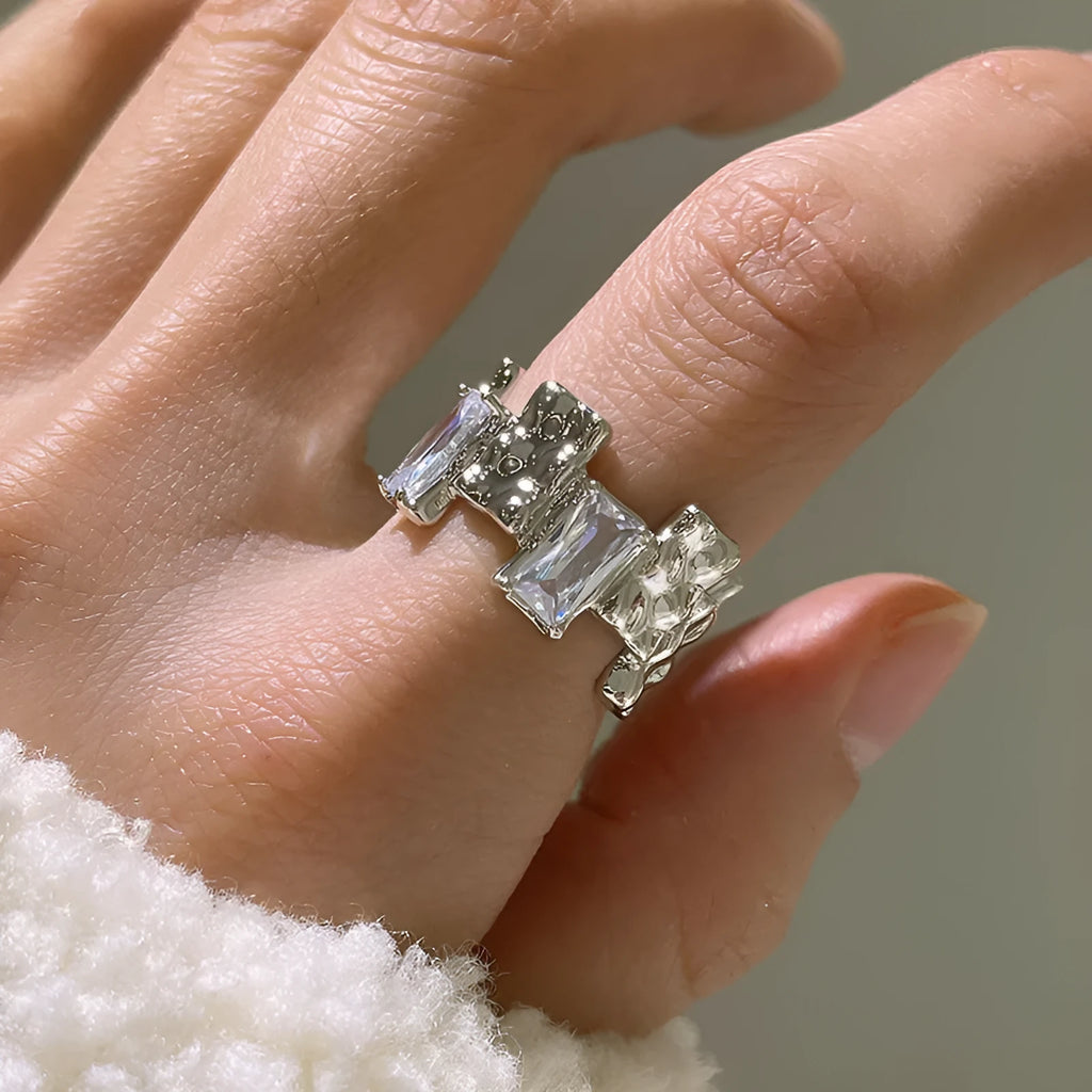 Geometric open silver ring with cross zircon decoration in retro style
