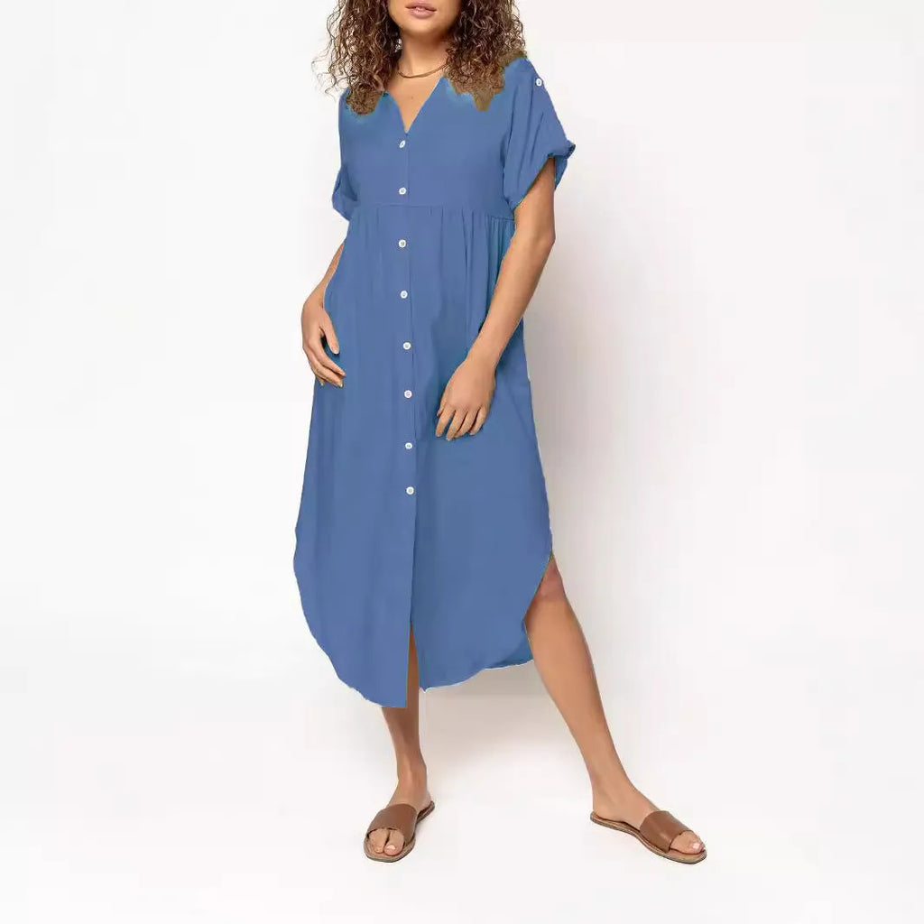 A loose-fitting, solid-colour mid-length casual dress with a front button closure and regular sleeves.