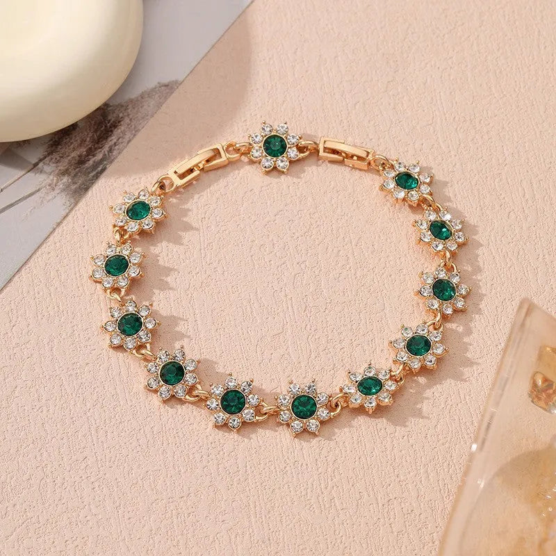 Flower charm bracelet in zinc alloy with electroplated finish and colourful crystal accents