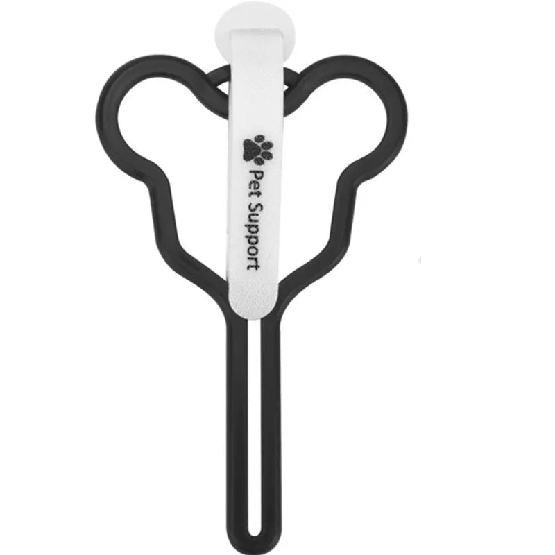 A hands-free dog poo bag holder with a fixed clip and adjustable Velcro strap attached to a dog lead.