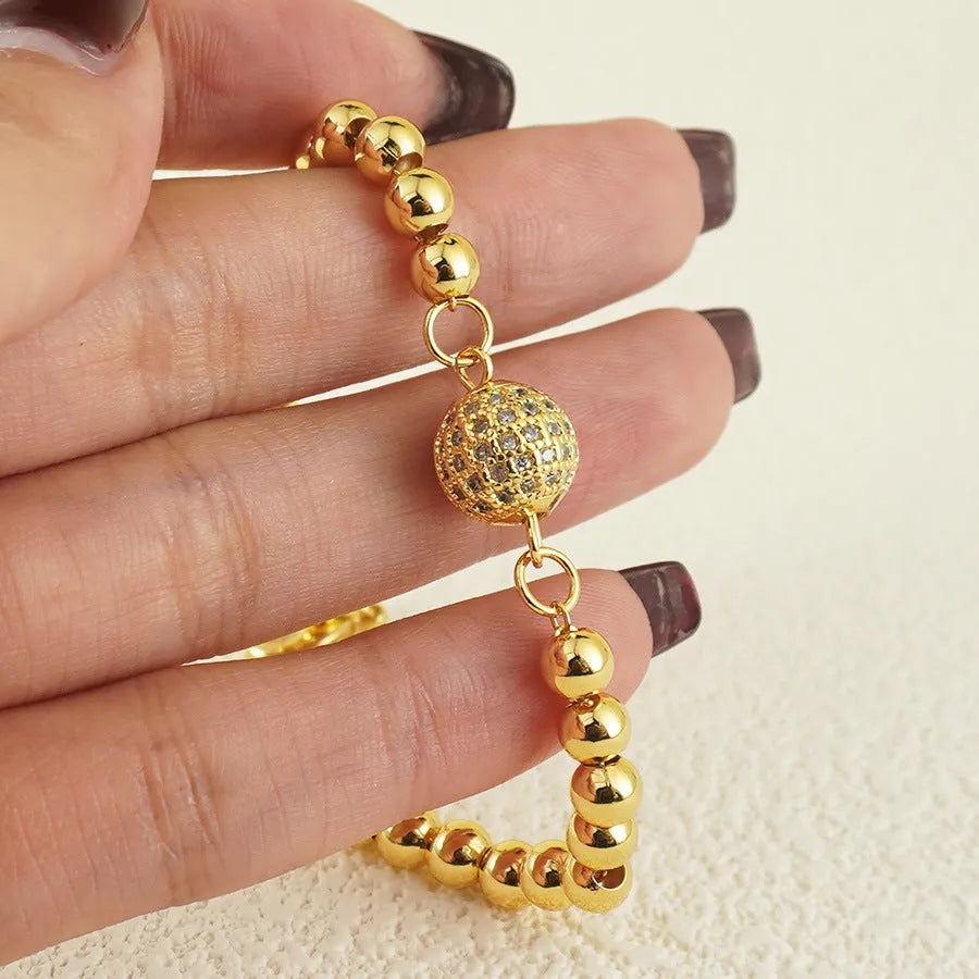 Arabic-style women's copper bracelet with heart-shaped links and single zircon stone decoration