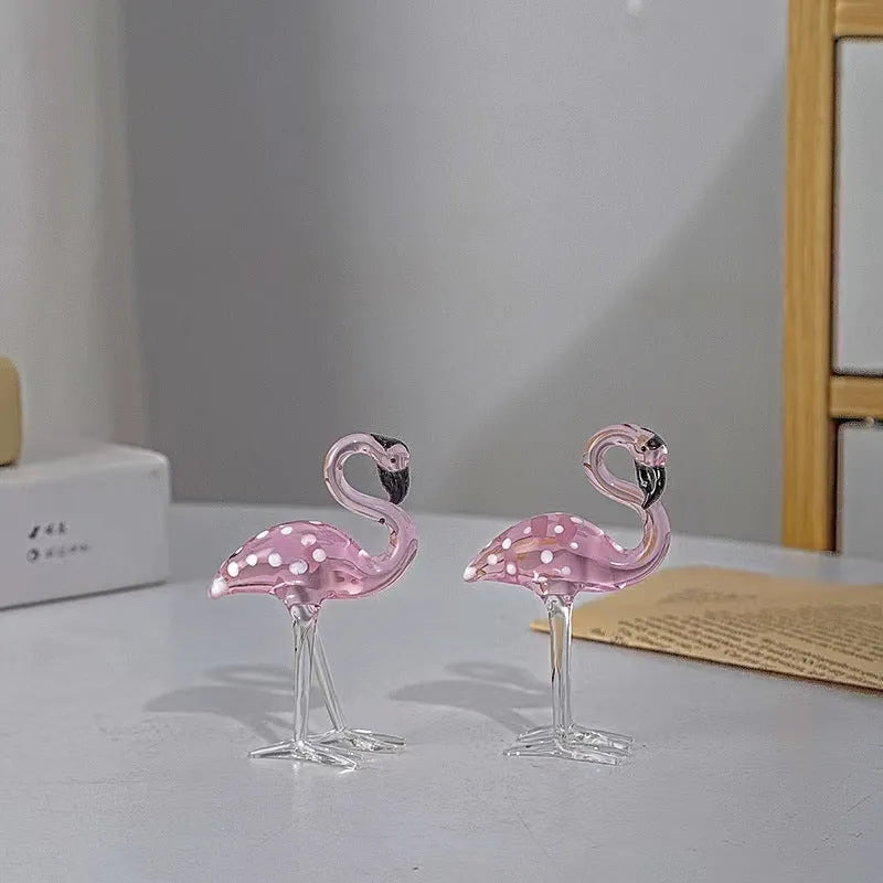 Pink and white crystal decorative flamingo table prop on a modern shelf