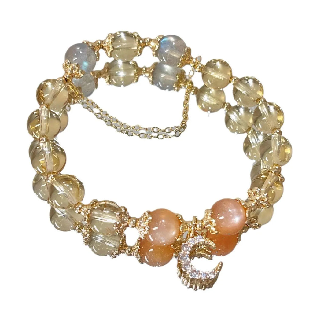 Chinese style women's crystal bracelet with electroplated 14K gilded finish and diamond-shaped moonstone golden sun stone elements