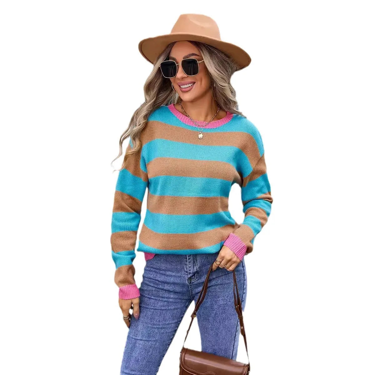 Women's loose blue acrylic sweater with flower pattern, round neck and long sleeves.
