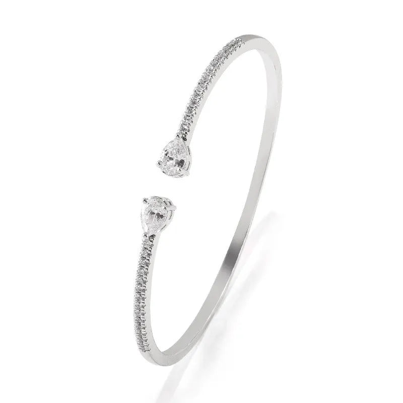 Personalised copper bracelet with multi-zircon inlay in white or blue colour option.