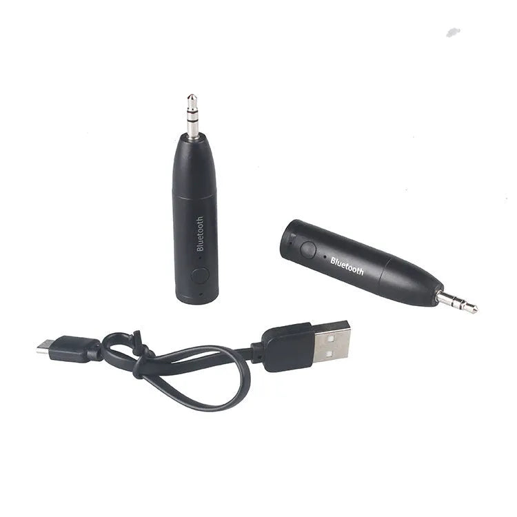 Black Bluetooth audio receiver for car stereo with AUX connection measuring 70mm by 14mm
