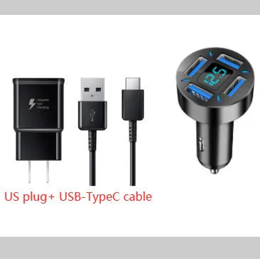 Black four-port USB car charger with LED digital display plugged into a vehicle socket.