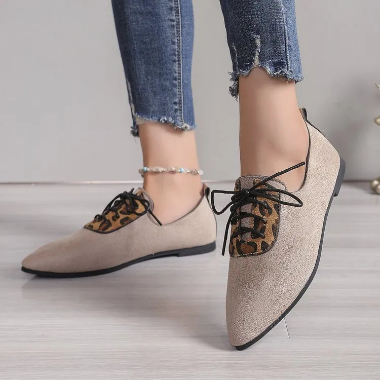 Beige leopard print pointed toe pumps for women in plus sizes.