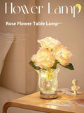 Modern crystal flowers design rechargeable touch table lamp on a bedside table.