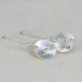 Silver retro bird and flower motif women's earrings with glossy finish