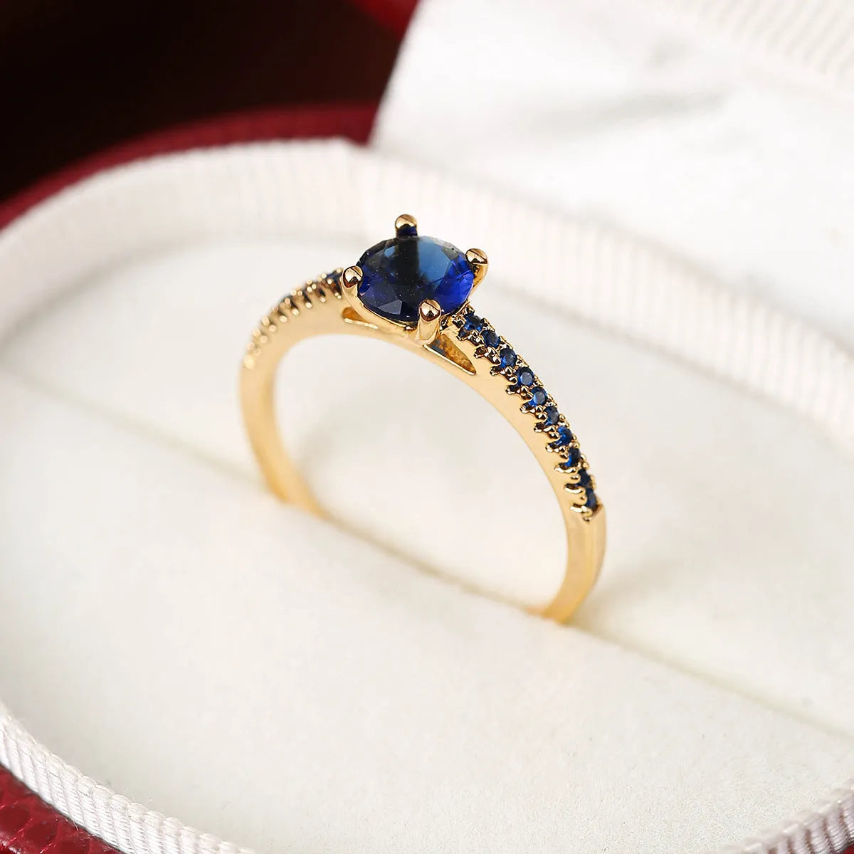 Geometric hexagon copper ring with zircon crystals in gold rose red finish