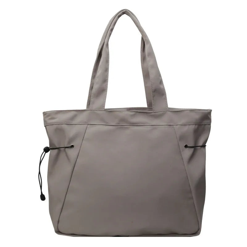 Soft folding Oxford cloth tote bag with shoulder handle in multiple colour options.
