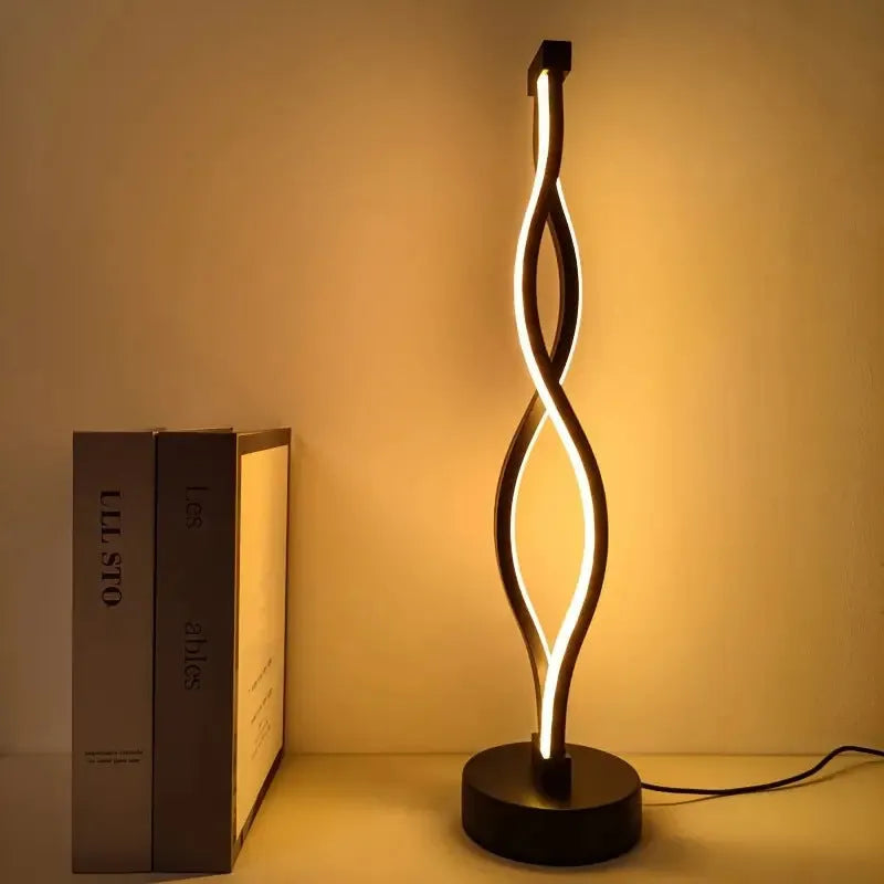 Black aluminium desk lamp with touch dimming controls and three colour temperature buttons
