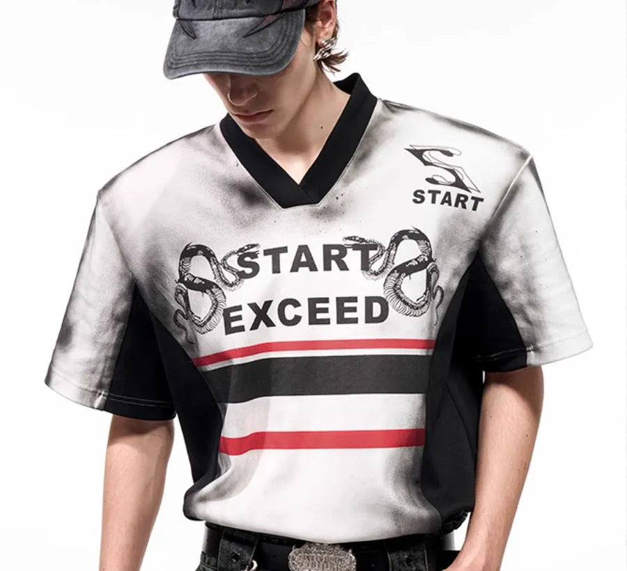 Korean-style women's V-neck short sleeve top with padded shoulders and a black and white letter snake pattern print.