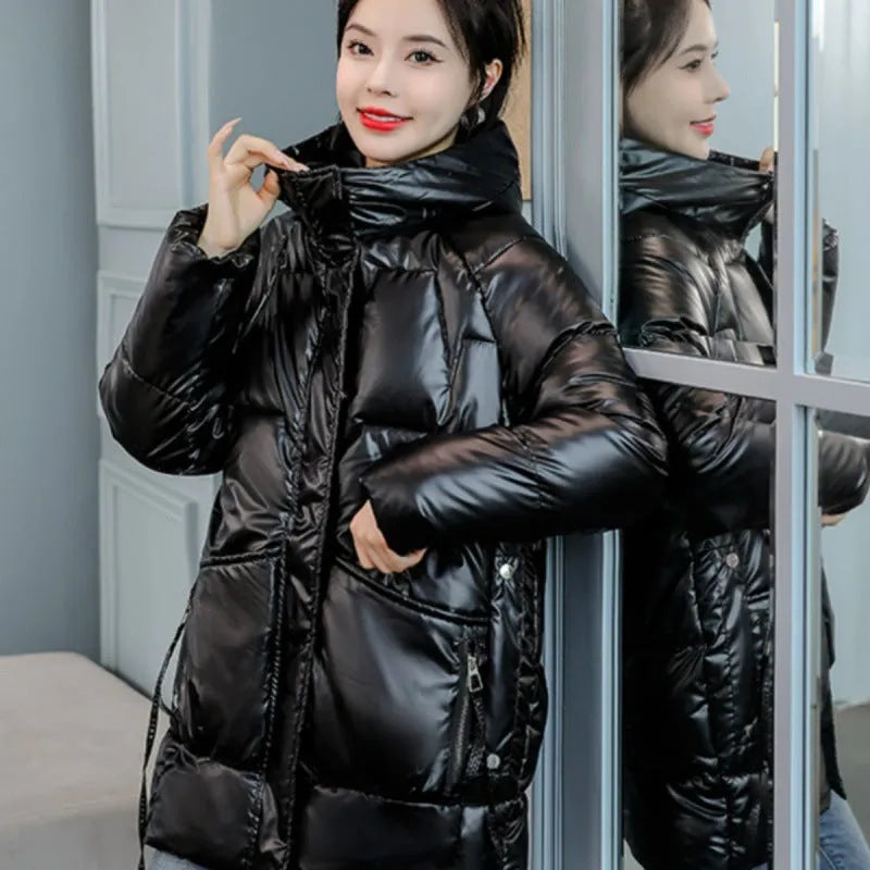Women's loose thick hooded winter jacket in blue, showing front view with long sleeves.