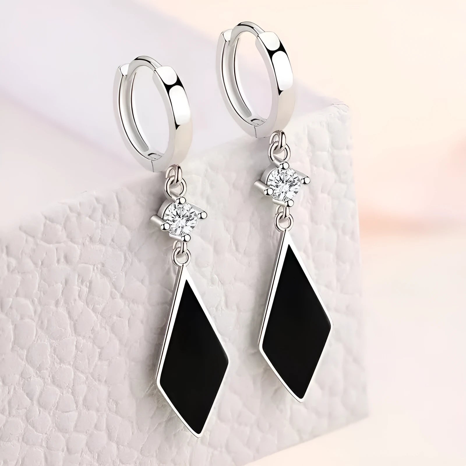 Vintage diamond geometric earrings with electroplated silver finish and ear clip fastening