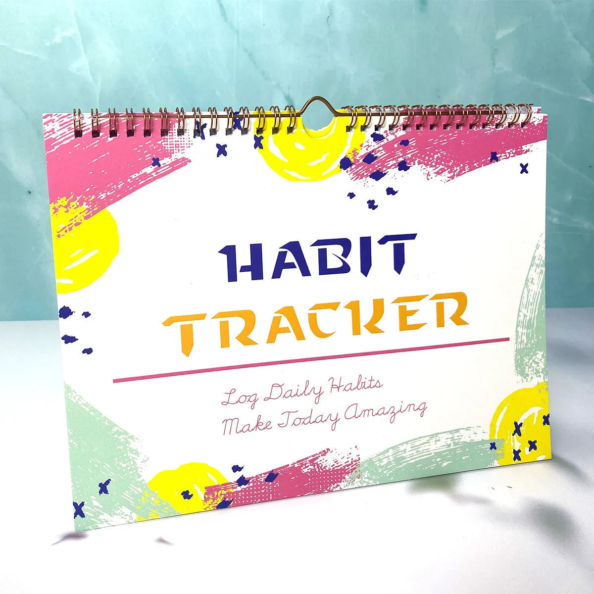 A4 habit tracking notebook in Flower White cover, open to show 12 internal pages for schedule recording.