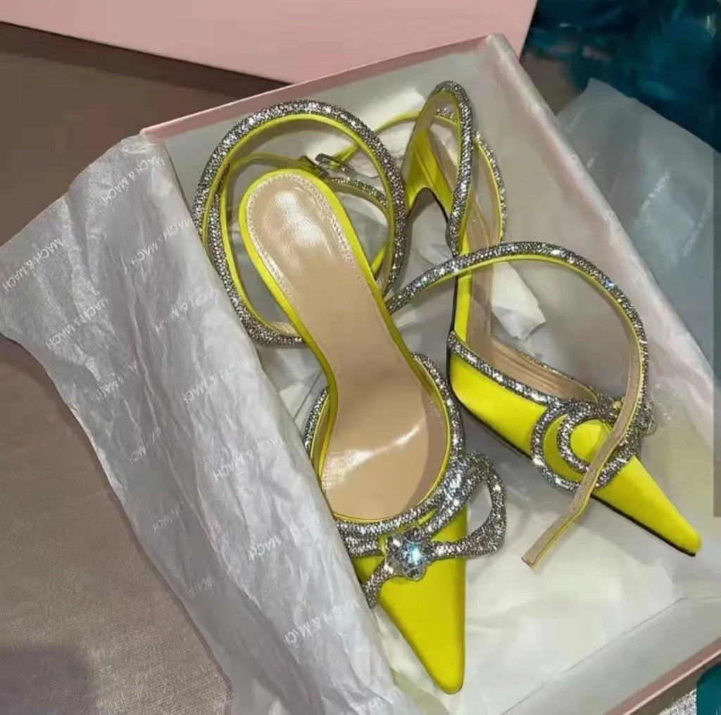 Women's black stiletto heel sandals with a pointed toe and an adjustable silk back bandage buckle.