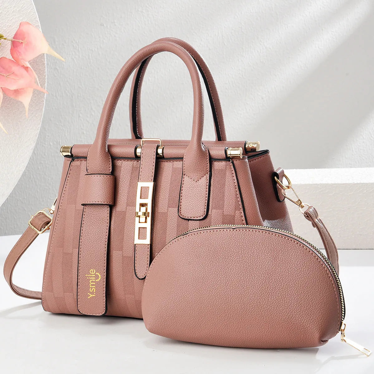 Round black PU leather crossbody handbag with shoulder strap