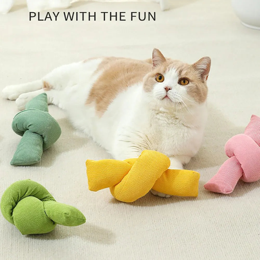 White knotted cotton dog rope toy for tugging and chewing.
