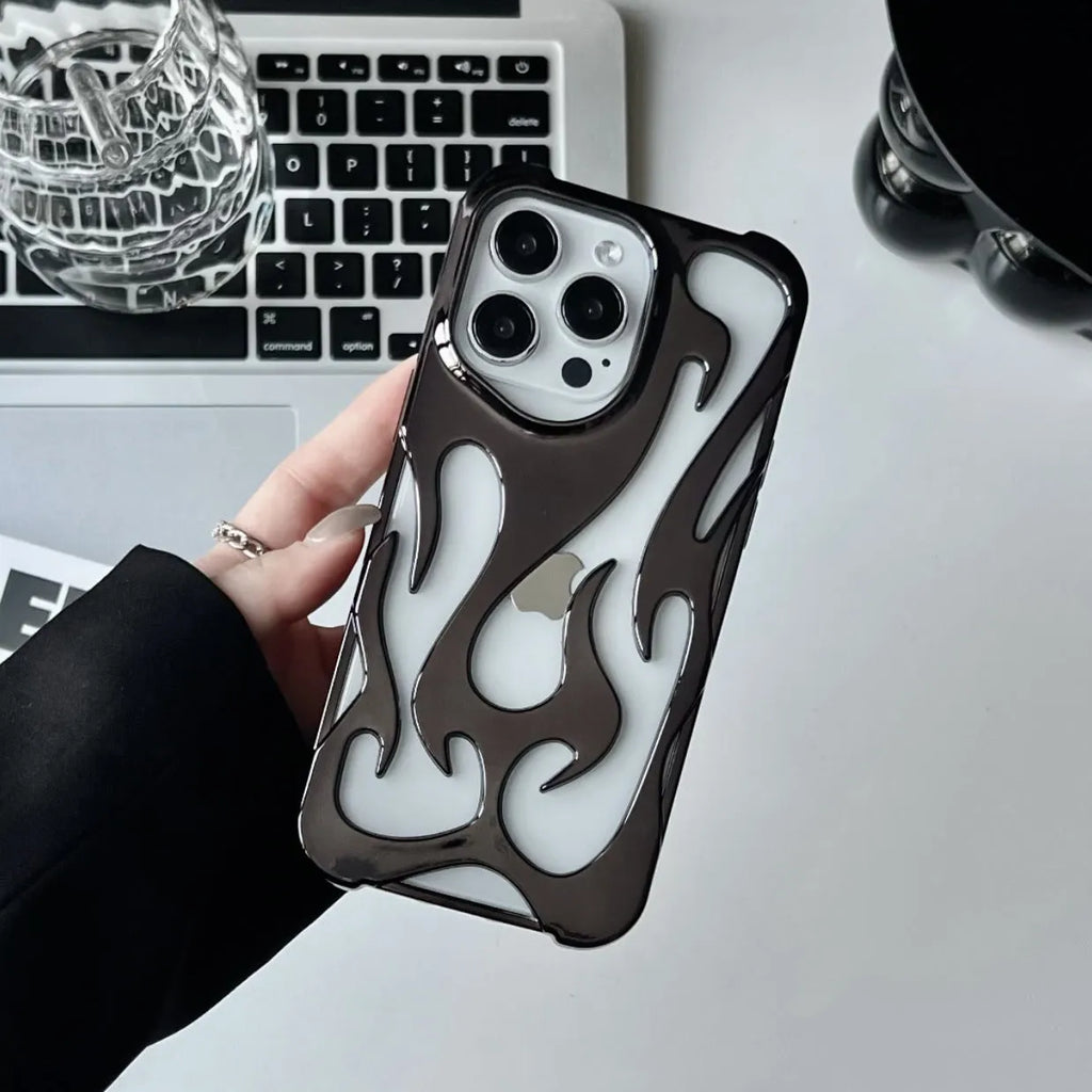 Electroplated hollow flame pattern iPhone case in silver TPU soft shell on a mobile phone.