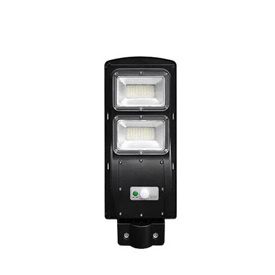Integrated solar street light with solar panel and LED light in single housing unit for outdoor installation
