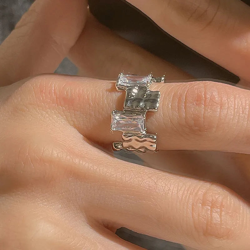 Geometric open silver ring with cross zircon decoration in retro style