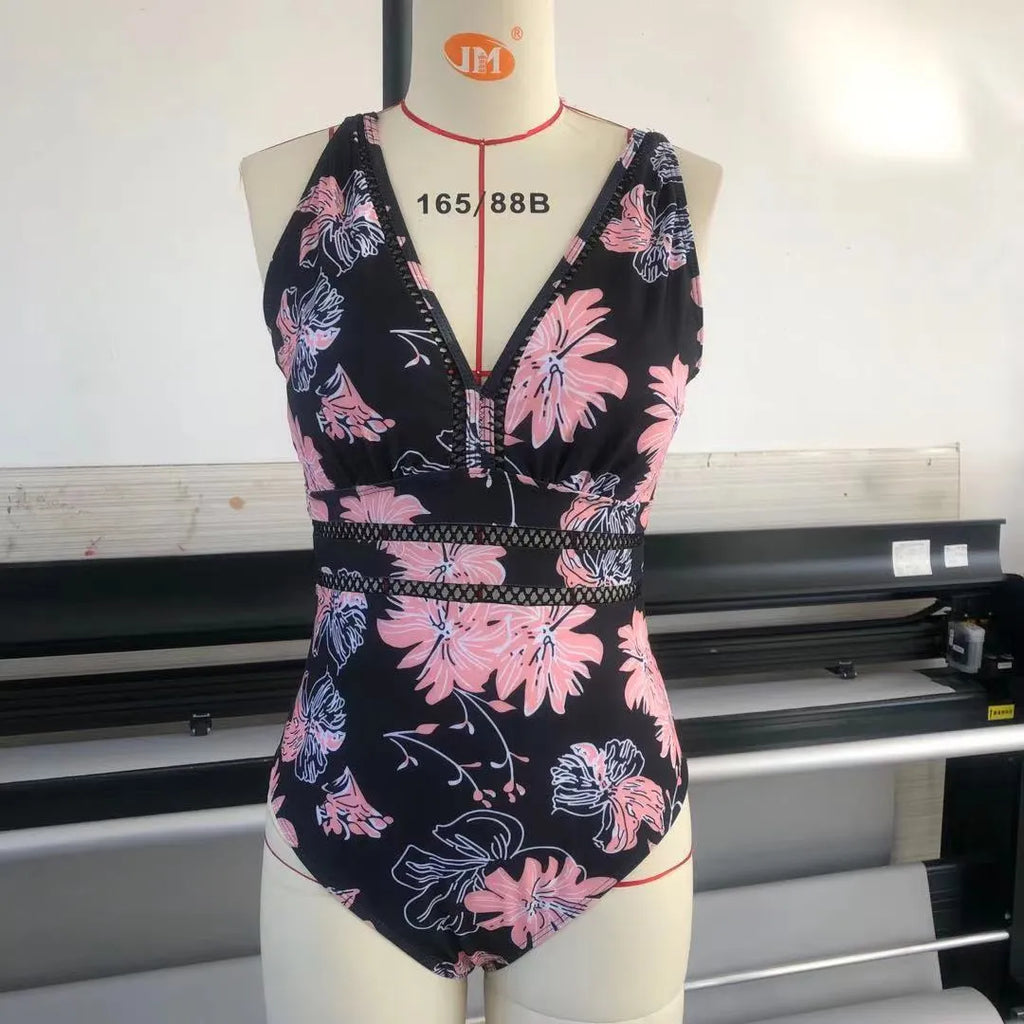 Black plus size women's bikini swimsuit with print pattern, showing front and back view.