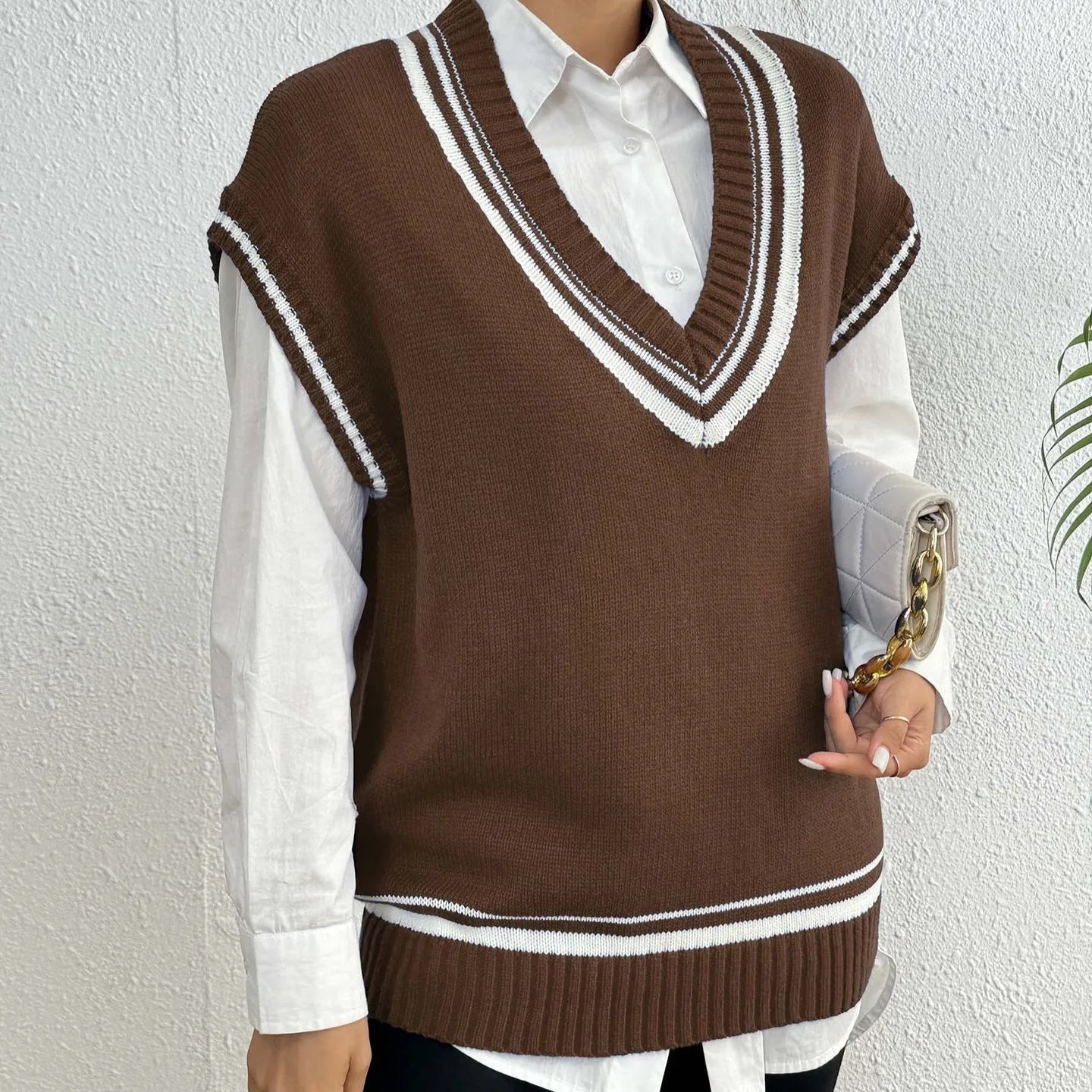 Blue loose women's wool vest sweater with a casual pullover design.