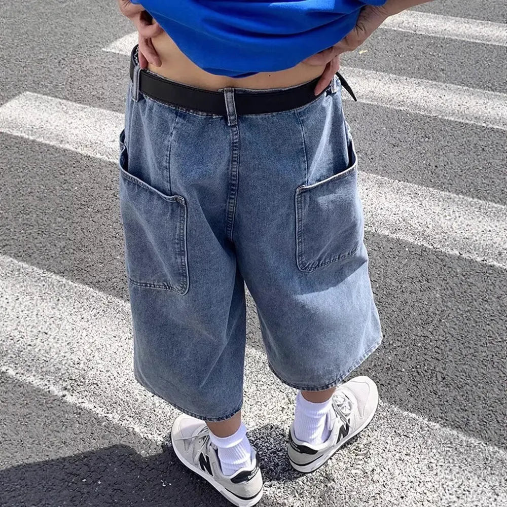 Man's washed light blue denim shorts with a high waist, cropped length, and straight legs.