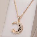Rose gold star and moon pendant necklace with zircon stone on an adjustable water wave chain.