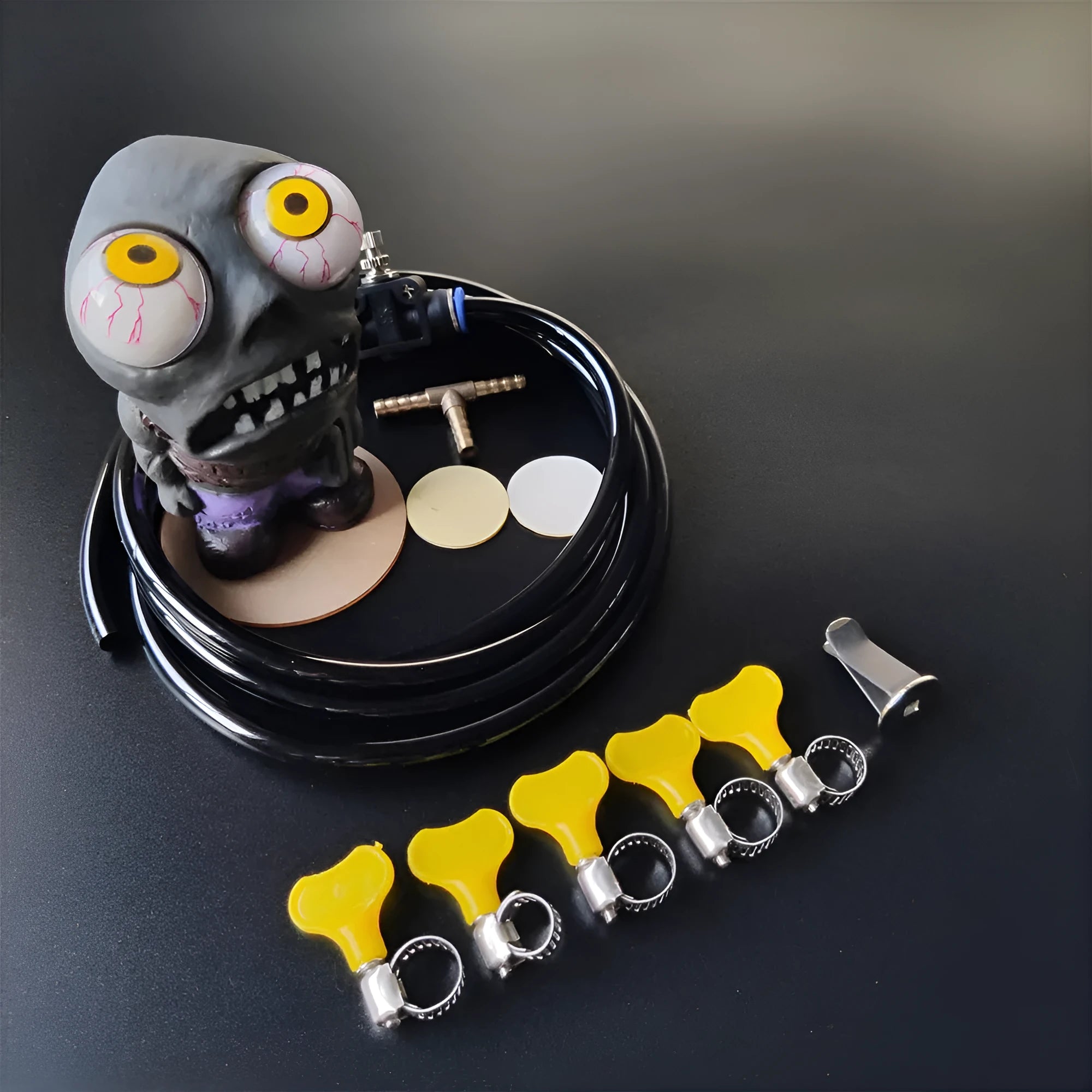 Turbo car blow off valve kit with explosive eye doll ornament and adjustable pressure regulating valve.