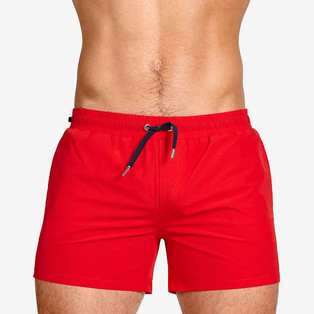 Polyester sports shorts with mesh lining in Army Green colour, shown flat.