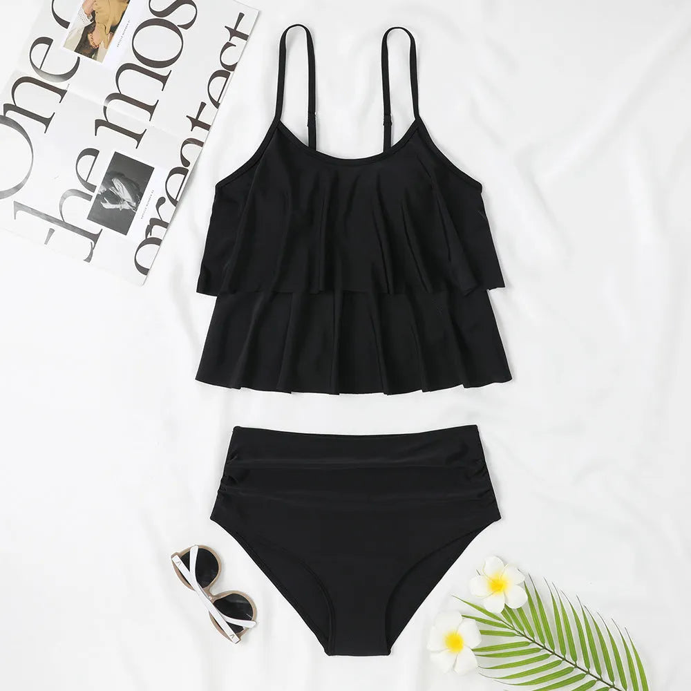 High-waist printed swimsuit in black with coconut tree pattern design