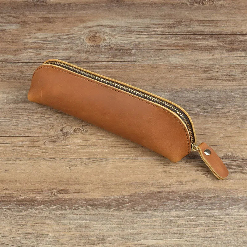 Genuine cowhide leather pencil case with zipper closure in square design measuring 18cm