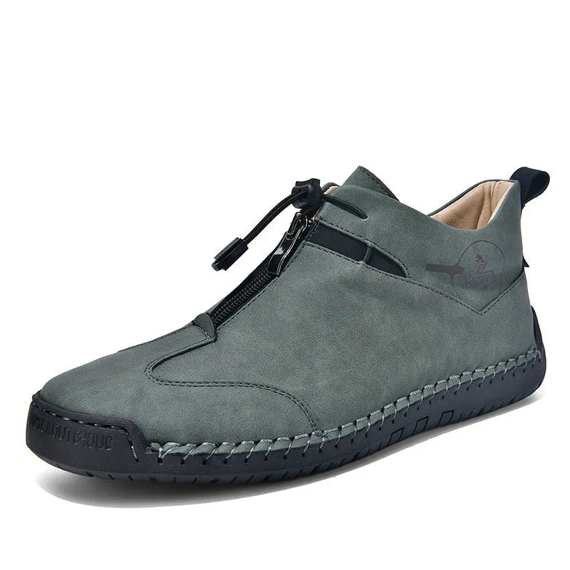 Men's casual leather shoes in black with a mid heel, rounded toe, and reinforced leather upper.