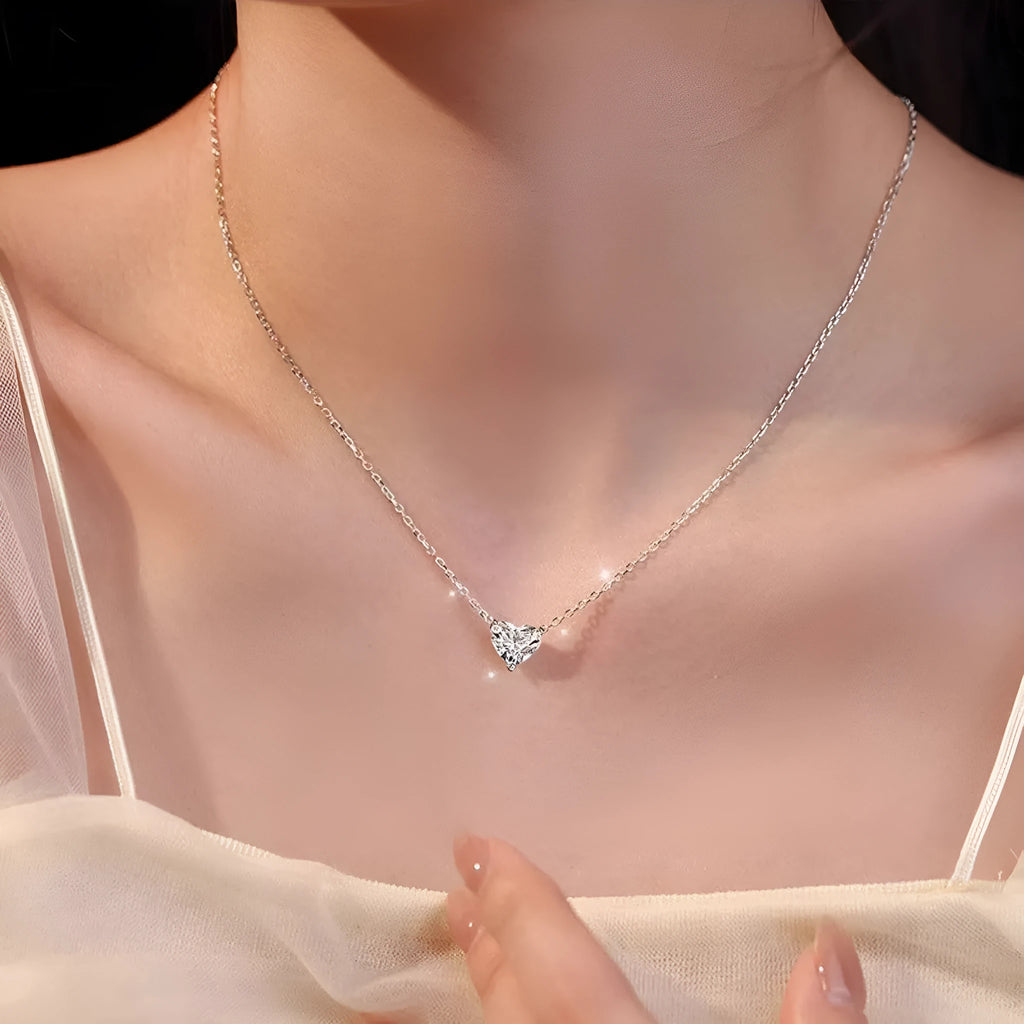 Silver-colour women's necklace with heart-shaped pendant in simple refined style