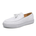 Men's plus size black tassel sneakers with round toe and oversleeve design on a rubber sole