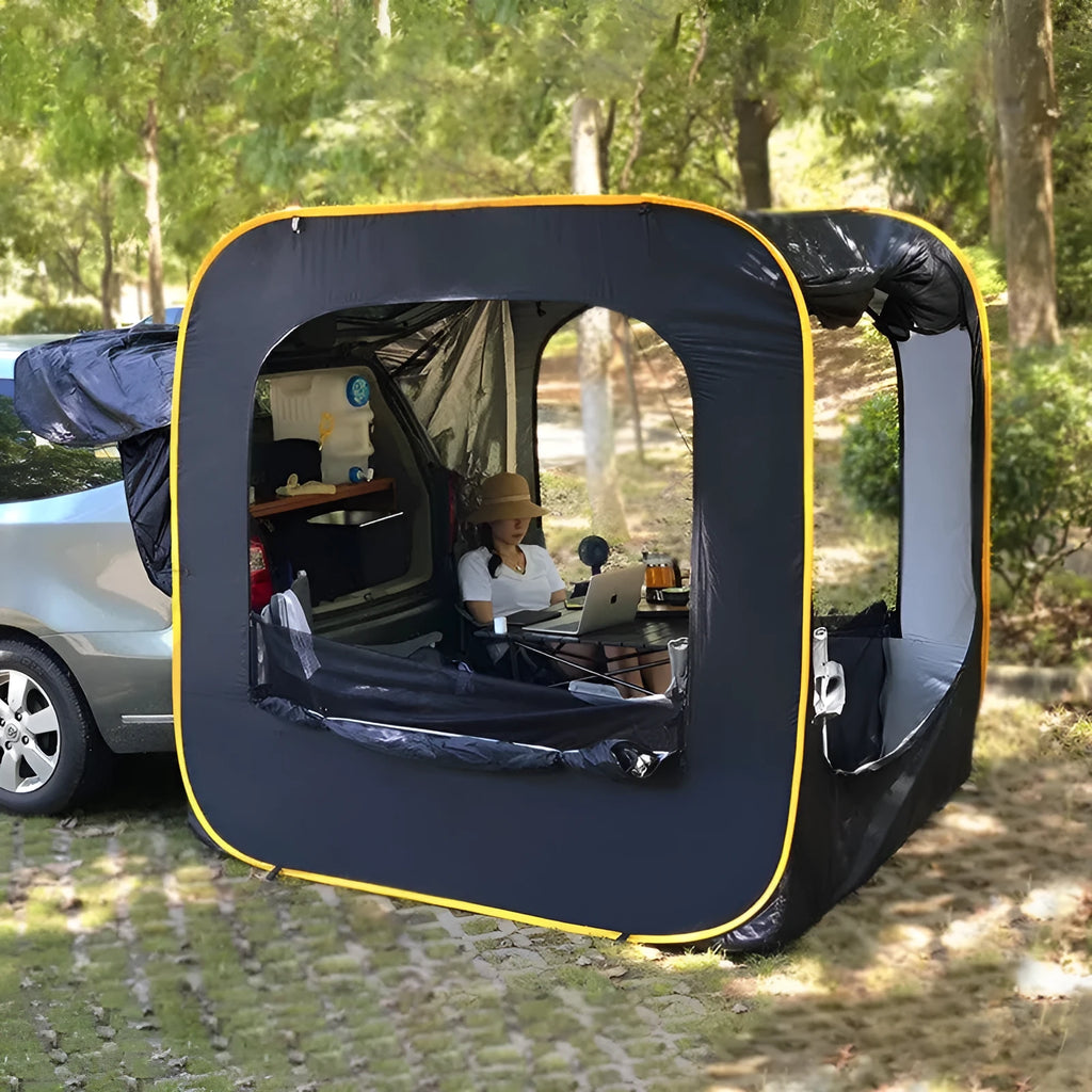 Black pop-up car tail tent with quick-throw setup shown connected to vehicle